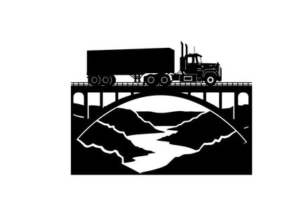 Truck silhouette crossing bridge over river with mountains silhouette