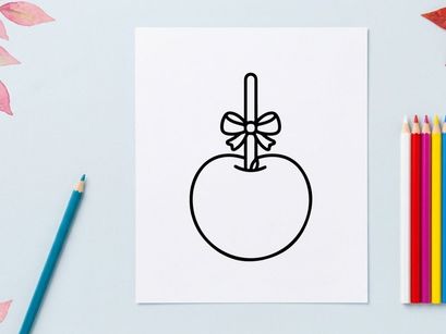 Hand-drawn apple illustration with decorative bow. Simple fruit sketch for educational and design projects.