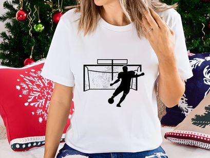 Soccer goalkeeper diving to block a shot on goal in a football match