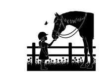 Silhouette of a child and horse by a fence