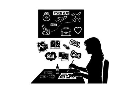 Silhouette of woman planning vision board with goals and inspiration