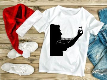 Silhouette of a man taking a photo with his smartphone and a keyboard preview picture