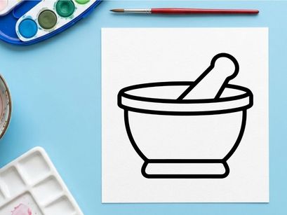 Mortar and pestle grinding herbs for natural remedies. Traditional apothecary tool for crushing spices and medicinal plants.