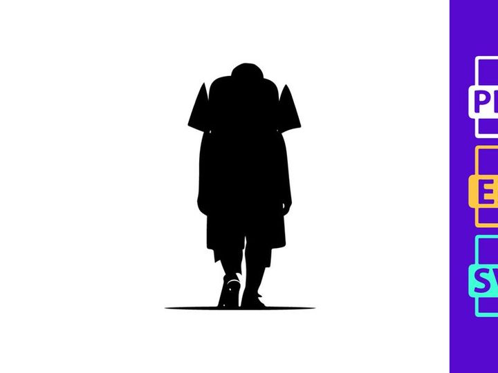 A silhouette of a male soccer player walking alone on a field