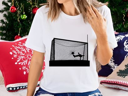 Soccer goalkeeper diving to block a shot on goal in a soccer match