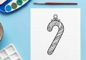 Decorative candy cane ornament line art illustration for Christmas holiday design projects.