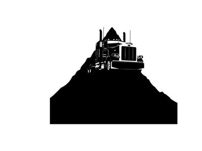Silhouette of a semi truck on a hill