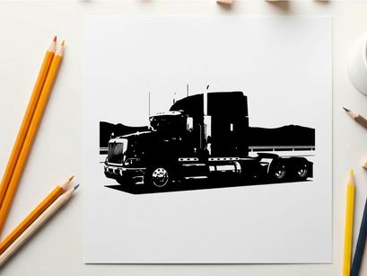 Silhouette of a semi truck on the road with mountains in the background