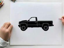 Silhouette of a classic pickup truck with a long bed and large tires
