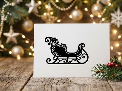 Black silhouette of a decorative Christmas sleigh isolated on a white background