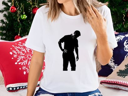 A man clutching his lower back in pain or discomfort