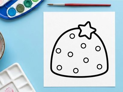Halloween cookie with star and candy dots. Festive spooky treat for party dessert decoration.