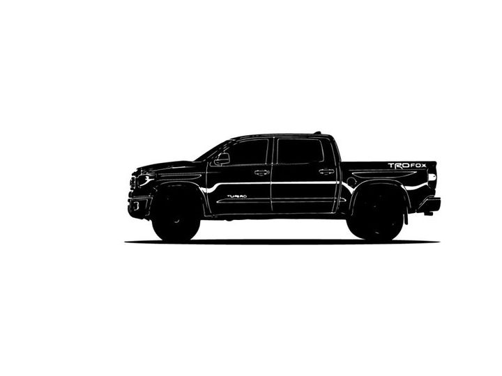 Silhouette of a black pickup truck against a white background