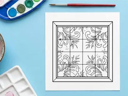 Christmas window decal with snowflake and floral swirl patterns on a glass pane