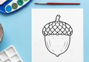 Close-up of an acorn with textured cap and smooth nut. Nature-inspired design element for autumn themes.