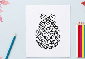 Decorative Christmas pine cone with bow. Festive holiday ornament for seasonal decor.