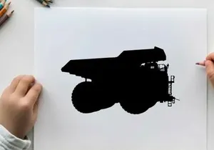 Silhouette of a tractor with a plow attachment
