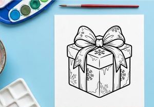 Elegant silver Christmas gift box with white ribbon bow for festive holiday celebrations