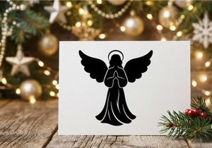 Silueta negra de un ángel en oración con alas y halo sobre fondo blanco