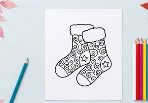 Hand-drawn Christmas socks with stars and swirls for festive holiday decor and gifts