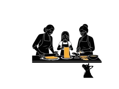 Silhouette of family cooking together in the kitchen with aprons on
