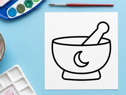 Mortar and pestle grinding herbs for natural remedies. Traditional apothecary tool for crushing spices and medicinal plants.