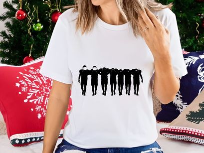 Seven people walking in a line with arms around each other's shoulders in black silhouette