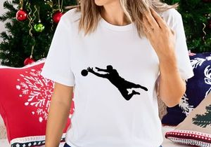 Silhouette of a person playing volleyball or handball in mid air