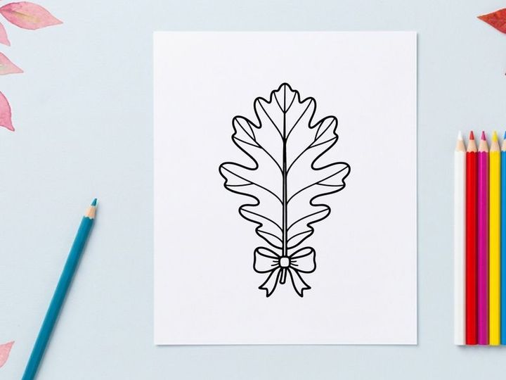 Elegant oak leaf with bow. Decorative botanical design for crafts and branding.