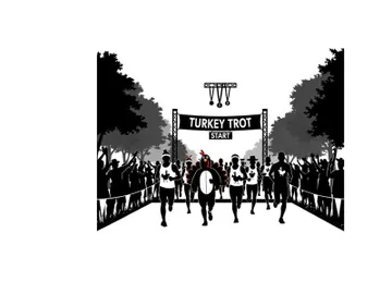 Silhouette of runners at the turkey trot 5k finish line with crowd preview picture