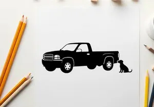 Silhouette of a pickup truck with a dog
