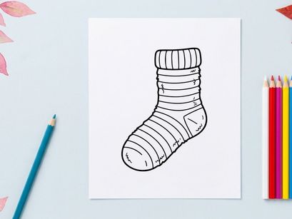 Single striped Christmas sock isolated on white background for festive holiday decor