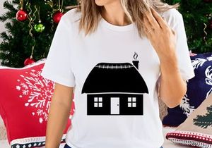 Thatched roof cottage with smoking chimney