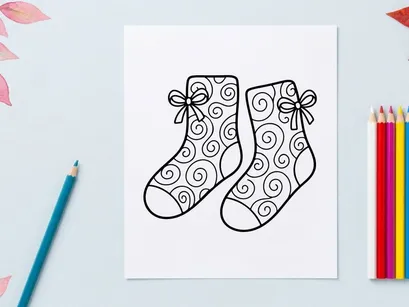 Pair of festive Christmas socks with snowflake and bow designs for holiday celebrations