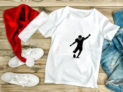 American football player kicking a ball in motion silhouette