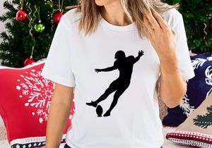 American football player kicking a ball in mid air motion silhouette