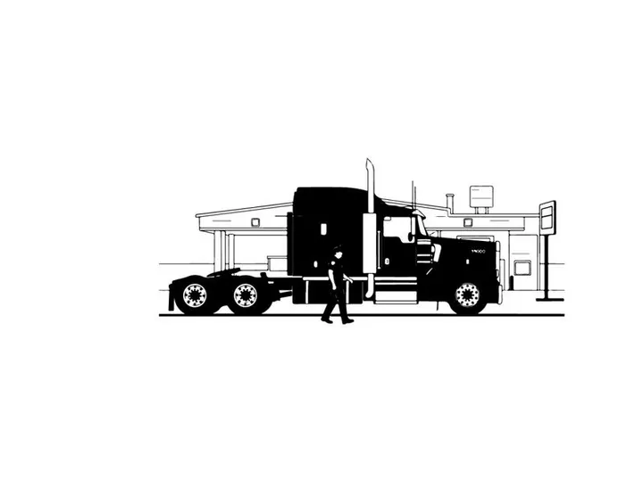 Silhouette of a man standing beside a large truck silhouette