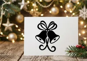 Black and white Christmas bells icon with decorative bow for holiday design projects
