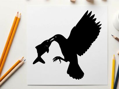 Silhouette of a bird catching a fish in mid air