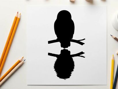 Silhouette of a bird perched on a branch with reflection