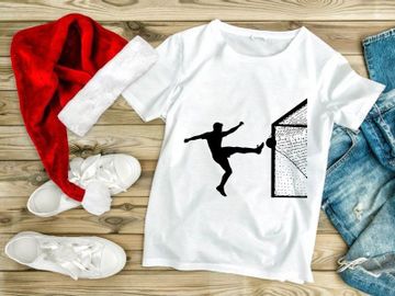 Soccer player kicking ball into goal net in dynamic motion preview picture