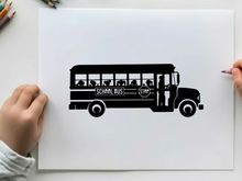 School bus silhouette with children inside
