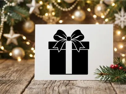 Schwarze und weiße Geschenkbox mit Schleife für Weihnachten oder Feierlichkeiten