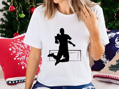 A silhouette of a triumphant athlete jumping over a hurdle in a celebratory pose