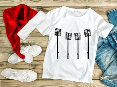 Four identical stadium lights on poles against a white background