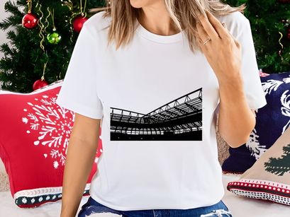 A black and white image of a large industrial building's roof structure