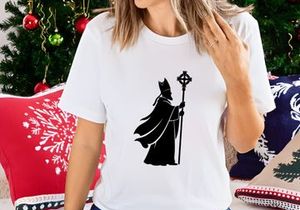 Bishop clergy religious leader holding cross staff silhouette black white