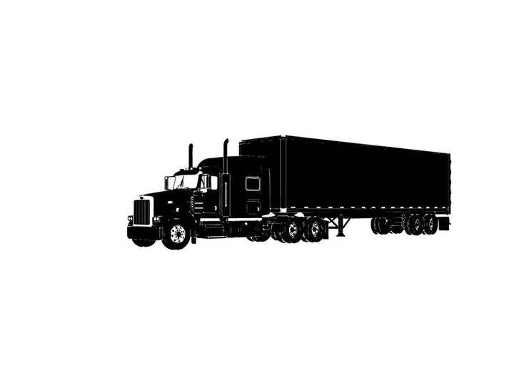 Silhouette of a large semi truck with trailer