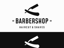 Barbershop logo in vintage style with the concept of scissors, razor and other tools.Logo for business, salon, label and barbershop.