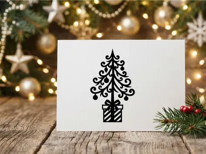 Black silhouette of a decorative Christmas tree with ornaments in a gift box icon.